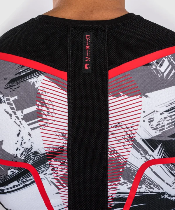 Venum Electron 3 0 Short Sleeve Rashguard Grey Red 6 Man modeling the Venum Electron 3.0 Short Sleeve Rashguard