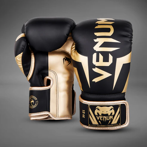 Venum Elite Boxing Gloves Black Gold 1 Venum Elite Boxing Gloves - Black/Gold in Black/Gold — studio shot