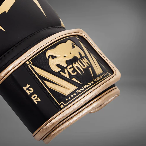 Venum Elite Boxing Gloves Black Gold 2 Venum Elite Boxing Gloves - Black/Gold in Black/Gold — graphic close‑up