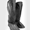 Venum Elite Evo Shin Guards in action