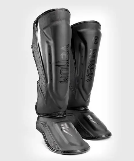Venum Elite Evo Shin Guards in action