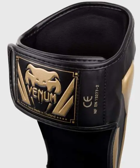 Venum Elite Standup Shin Guards in black and white color