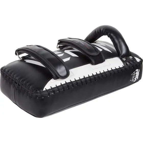 Man holding a pair of Venum Giant Kick Pads