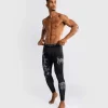 Man wearing Venum Gladiator 5.0 men's spats compression tights