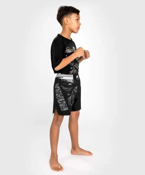 Venum Gorilla Jungle Kids Fightshorts Black White 2 Venum Gorilla Jungle Kids Fightshorts on white background