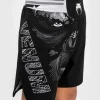 Venum Gorilla Jungle Kids Fightshorts Black White 3 Kid wearing Venum Gorilla Jungle Kids Fightshorts