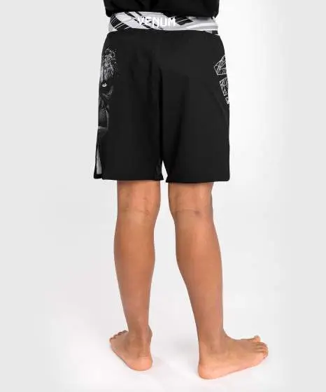 Venum Gorilla Jungle Kids Fightshorts Black White 5 Kids wearing Venum Gorilla Jungle Fightshorts