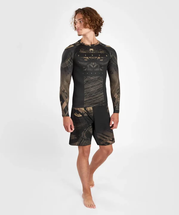 Man wearing a Venum Gorilla Jungle Long Sleeve Rash Guard.