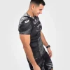 Venum Gorilla Jungle Short Sleeve Rash Guard Black White 1 Man wearing a Venum Gorilla Jungle Short Sleeve Rash Guard