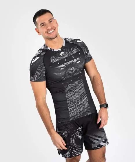 Venum's Gorilla Jungle Short Sleeve Rash Guard in Action Venum Gorilla Jungle Short Sleeve Rash Guard worn by a professional fighter