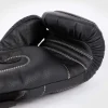 Venum Impact Evo Boxing Gloves Black 4 Venum Impact Evo Boxing Gloves on white background