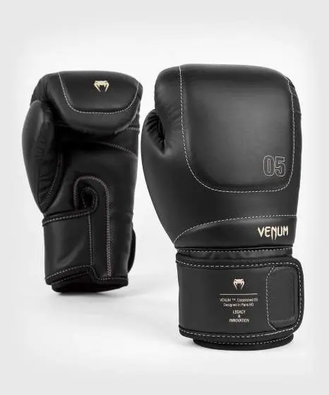 Venum Impact Evo Boxing Gloves Black 5 Venum Impact Evo Boxing Gloves on a white background