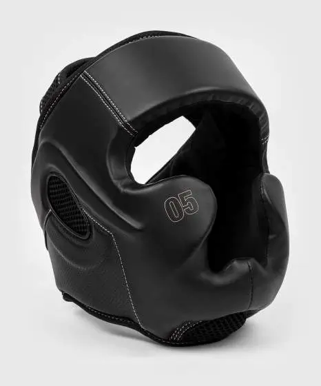 Venum Impact Evo Headgear Head Guard Black 1 Man wearing Venum Impact Evo Headgear Head Guard