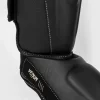 Venum Impact Evo Shinguards in action