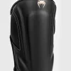 Venum Impact Evo Shinguards in black and white