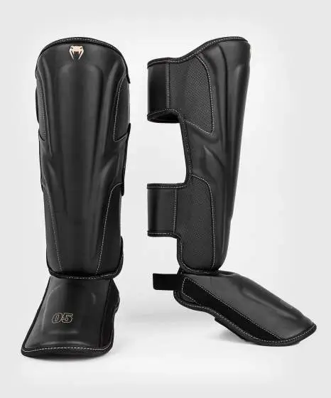 Venum Impact Evo Shinguards in black