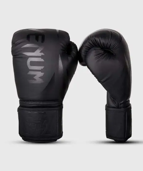 Child wearing Venum Kids Challenger 2.0 Boxing Gloves