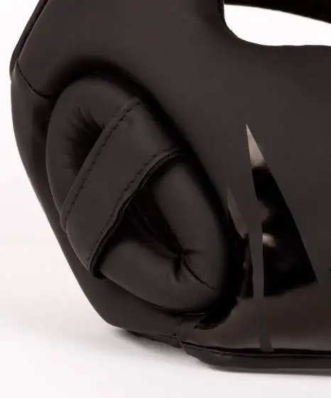 Child wearing Venum Kids Challenger Headgear Headguard for boxing
