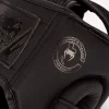Child wearing a Venum Kids Challenger Headgear Headguard