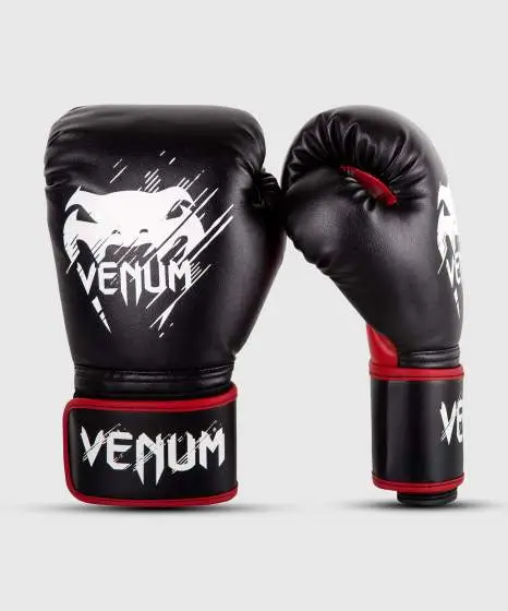 Kid wearing Venum Kids Contender Boxing Gloves