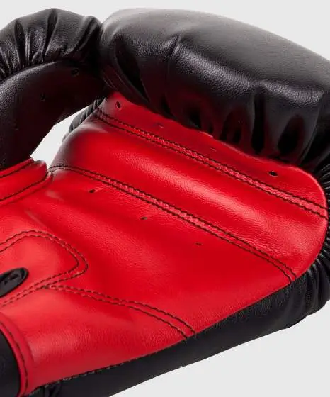 A pair of Venum Kids Contender Boxing Gloves on neutral background.