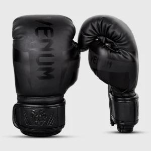 Child wearing Venum Kids Elite Boxing Gloves