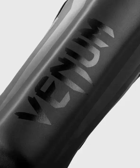 Venum Kids Elite Shin Guards in action