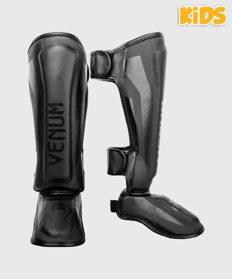 Child wearing Venum Kids Elite Shin Guards