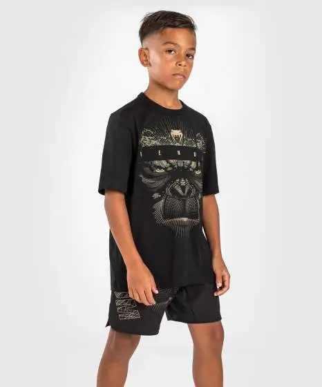 Venum Kids Gorilla Jungle T Shirt Black Sand 1 Child wearing Venum Kids Gorilla Jungle T-Shirt