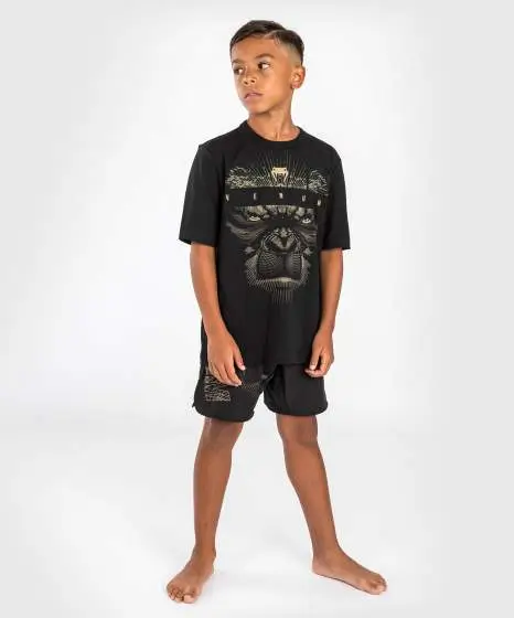 Venum Kids Gorilla Jungle T Shirt Black Sand 2 Child wearing Venum Kids Gorilla Jungle T-Shirt