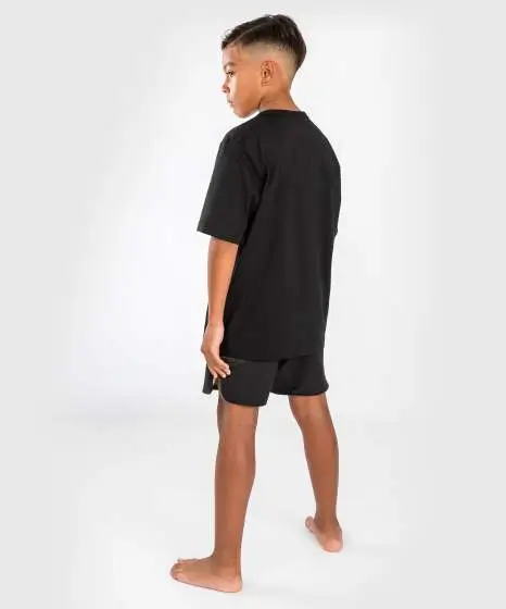Venum Kids Gorilla Jungle T Shirt Black Sand 3 Kid wearing Venum Kids Gorilla Jungle T-Shirt