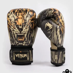 Kid wearing Venum Kids Tiger Boxing Gloves