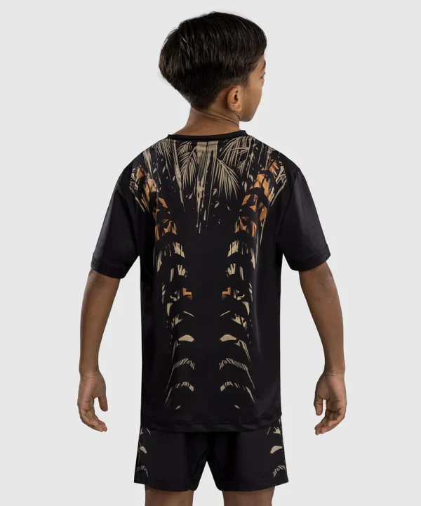 Venum Kids Tiger Dry Tech T Shirt Black Orange 3 Child wearing Venum Kids Tiger Dry Tech T-Shirt
