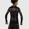 Venum Kids Tiger Long Sleeve Rash Guard Black Orange 2 Kid wearing Venum Kids Tiger Long Sleeve Rash Guard