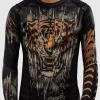 Venum Kids Tiger Long Sleeve Rash Guard Black Orange 3 Child wearing Venum Kids Tiger Long Sleeve Rash Guard