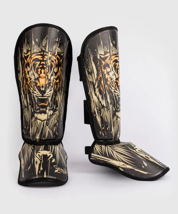 Child wearing Venum Kids Tiger Shin Guards