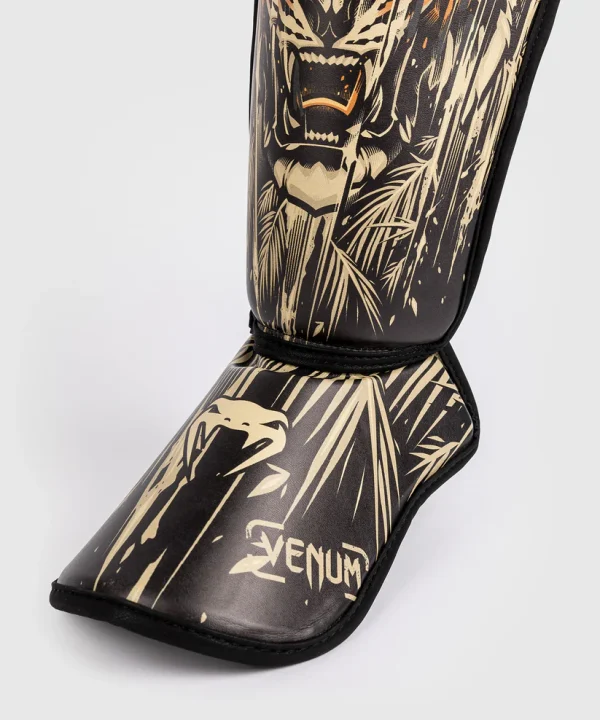 Child wearing Venum Kids Tiger Shin Guards