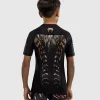 Venum Kids Tiger Short Sleeve Rash Guard Black Orange 3 Child wearing Venum Kids Tiger Short Sleeve Rash Guard.