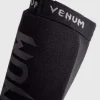 Venum Kontact Cotton Shin Guards on white background