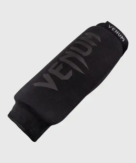 Venum Kontact Cotton Shin Guards No Foot Black 1 Close-up view of Venum Kontact cotton shin guards with no foot