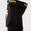 Venum Kontact Elbow Protector Guard Black Gold 1 Venum Kontact Elbow Protector Guard in action