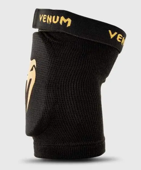Venum Kontact Elbow Protector Guard Black Gold 1 Venum Kontact Elbow Protector Guard in action