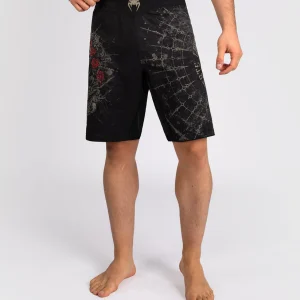 Man wearing Venum Santa Muerte 5.0 Men's Fightshorts