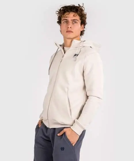 Man wearing Venum Strikeland Full Zip Hoodie
