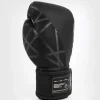 Venum Tecmo 2 0 Boxing Gloves Black 3 Closeup of Venum Tecmo 2.0 Boxing Gloves in professional setting