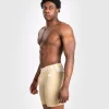 Venum Tempest Mens Vale Tudo Shorts Beige Sand 2 Man wearing Venum Tempest Vale Tudo shorts