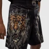 Venum Tiger Kids Fight Shorts Black Orange 3 Child wearing Venum Tiger Kids Fight Shorts