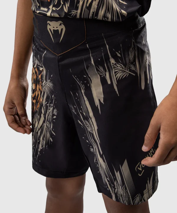 Venum Tiger Kids Fight Shorts Black Orange 4 Venum Tiger Kids Fight Shorts on a neutral background