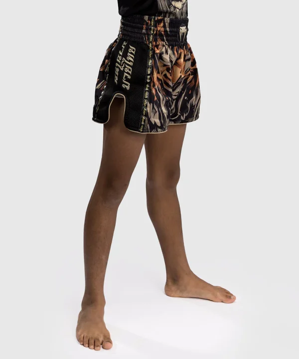Venum Tiger Kids Muay Thai Shorts Black Orange 1 Venum Tiger Kids Muay Thai Shorts in action