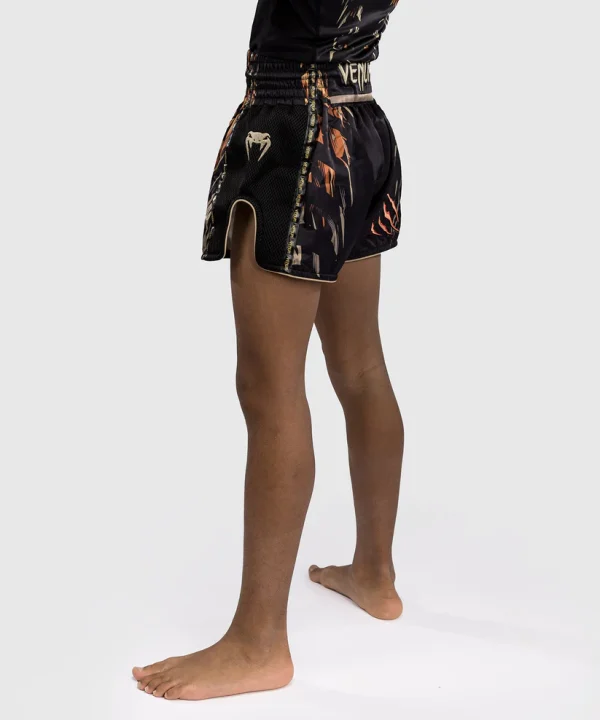 Venum Tiger Kids Muay Thai Shorts Black Orange 2 Kids wearing Venum Tiger Muay Thai Shorts